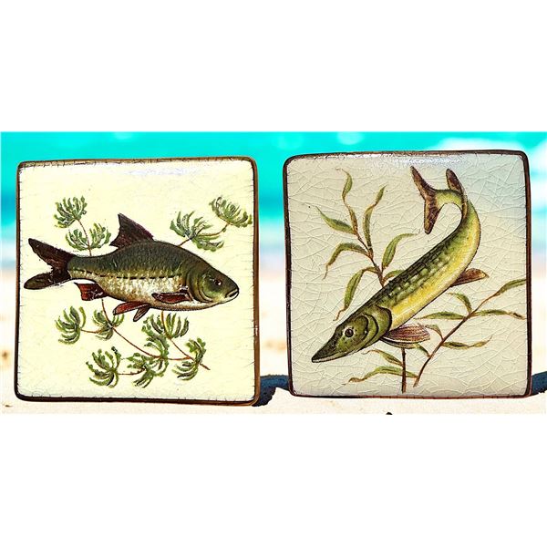 A PAIR OF DIVISION THREE STUDIO ARTIST BUTTONS