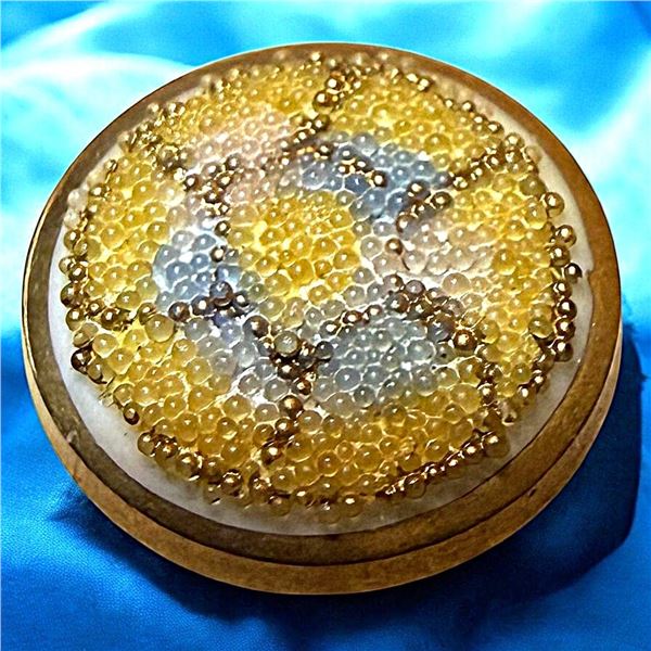 A DIVISION ONE CORALENE GLASS BUTTON