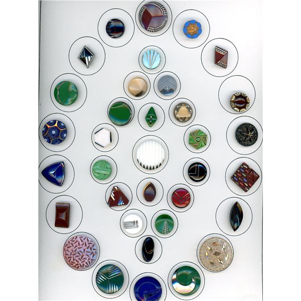 A CARD OF DIVISION THREE GLASS BUTTONS'