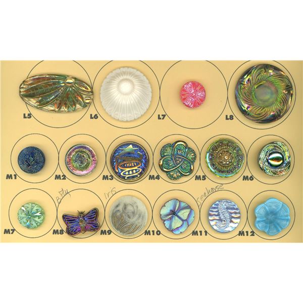 A SMALL CARD OF DIVISION THREE GLASS BUTTONS