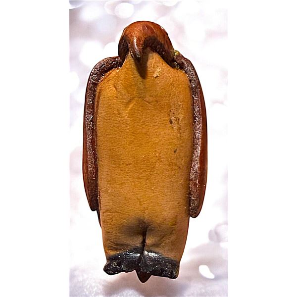 A DIVISION THREE REALISTIC LEATHER BUTTON