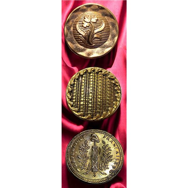 A SMALL CARD OF EARLY REPOUSSE BUTTONS