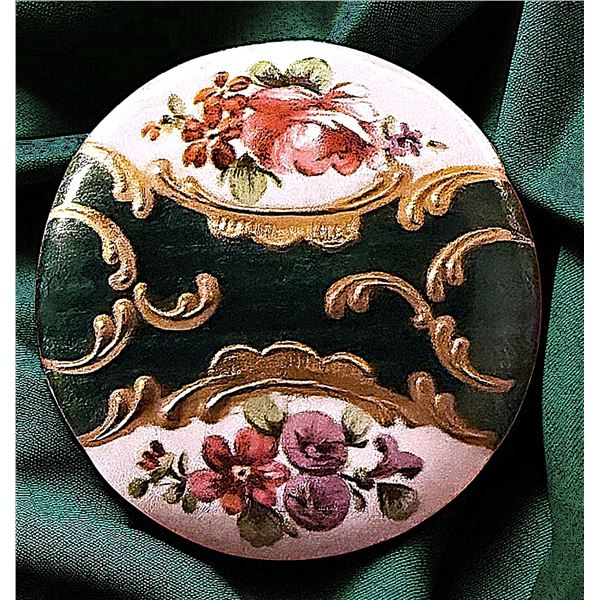 A DIVISION ONE COUNTER ENAMELED FLORAL BUTTON