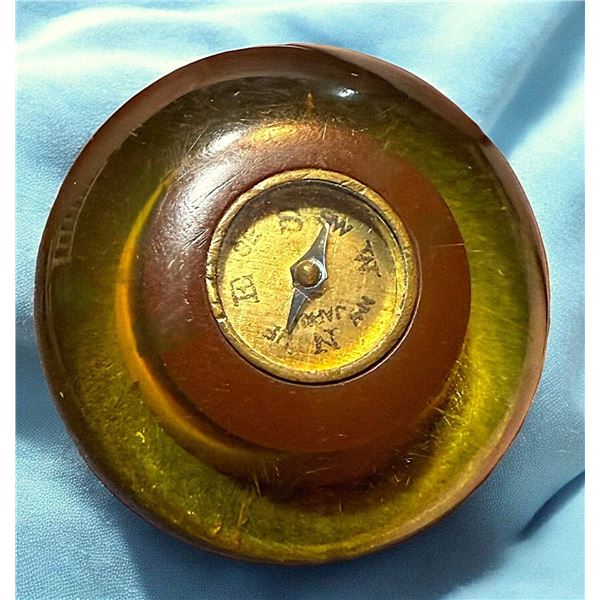 A DIVISION THREE BAKELITE OBJECT BUTTON