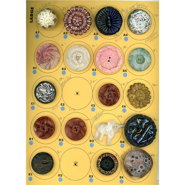 A CARD OF DIVISION THREE COUTURE STUDIO BUTTON