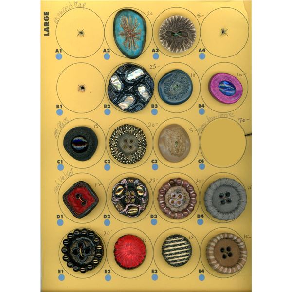 A CARD OF DIVISION THREE COUTURE STUDIO BUTTON