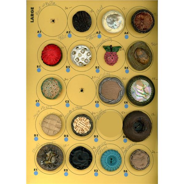 A CARD OF DIVISION THREE COUTURE STUDIO BUTTON