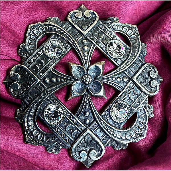 A DIVISION ONE PIERCED BRASS AND PASTE JEWEL BUTTON