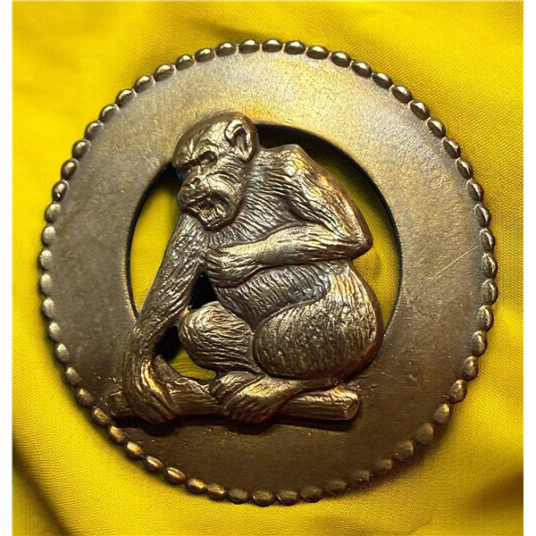 A DIVISION THREE STUDIO ARTIST BUTTON