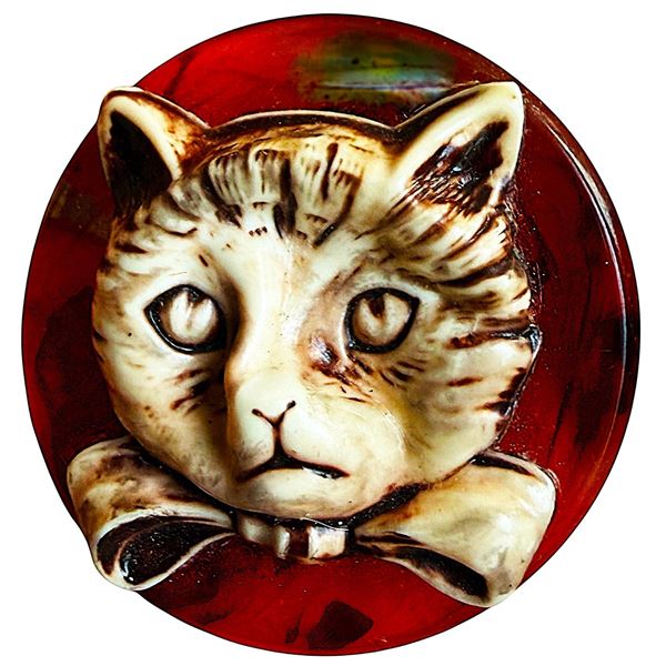A DIVISION THREE TWO MATERIAL CAT BUTTON