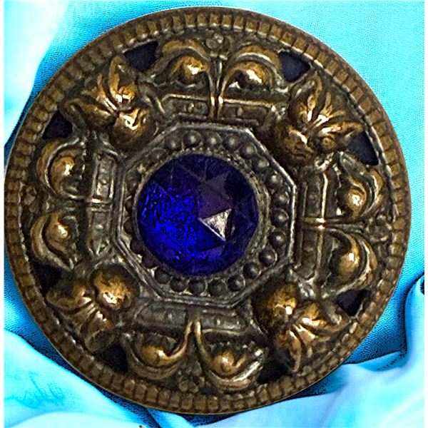 A SCARCE DIVISION THREE JEWELED BAKELITE BUTTON