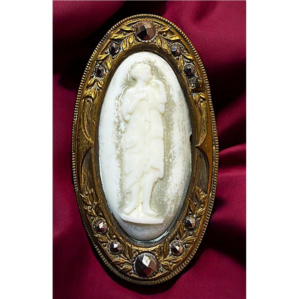 A DIVISION ONE GLASS IN METAL FIGURAL BUTTON