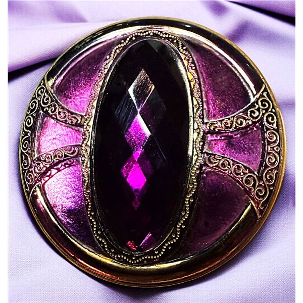 A DIVISON GLASS SET IN METAL BUTTON