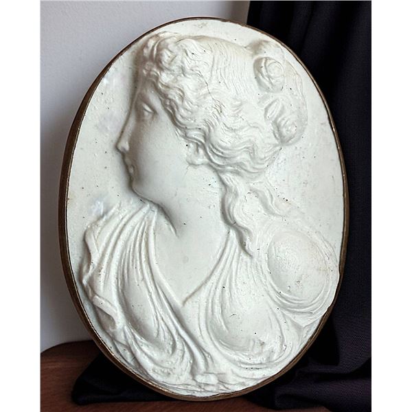 A HARD TO FIND DIVISION ONE CARVED LAVA BUTTON