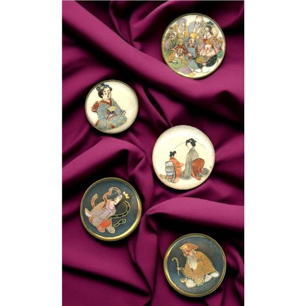 A SMALL CARD OF DIVISION THREE JAPANESE BUTTONS