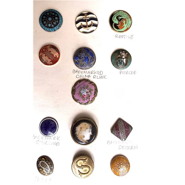 A SMALL CARD OF ASSORTED ENAMEL AND PORCELAIN BUTTONS