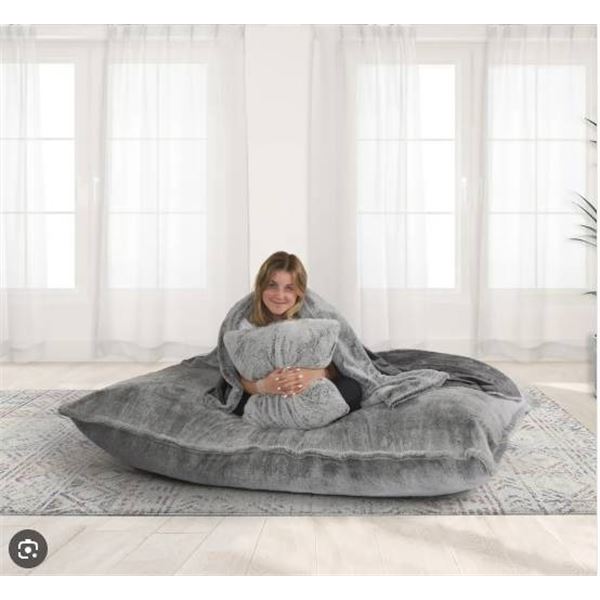 Oversized Gray Floor Pillow With Quilted Texture
