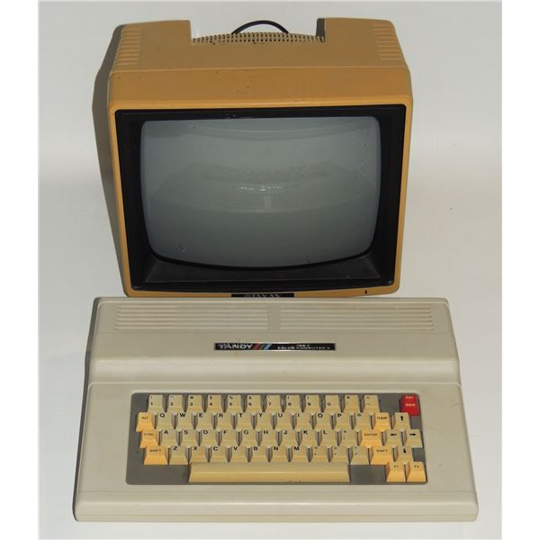 #843 Tandy 128K Computer w/ Taxan Works!