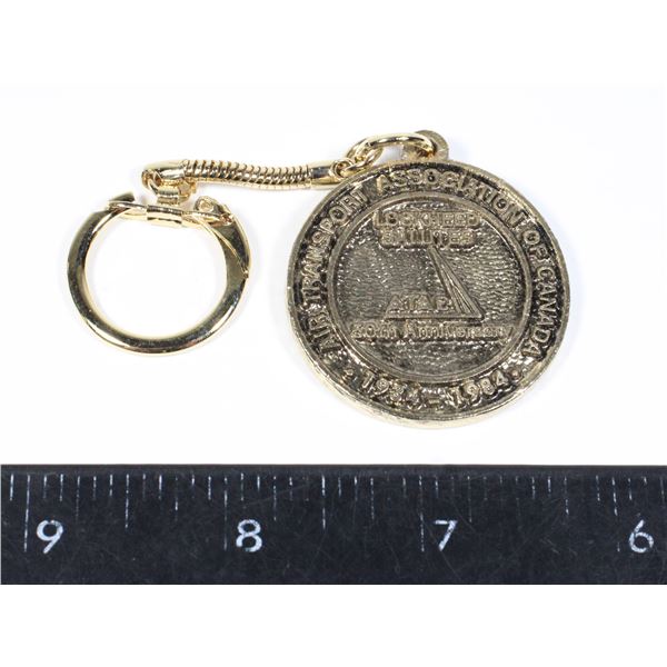 #1041 Lockheed 1984 Keychain Canadian