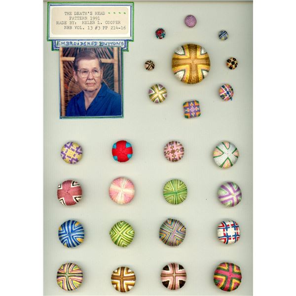 A CARD OF DIVISION ONE FABRIC BUITTONS