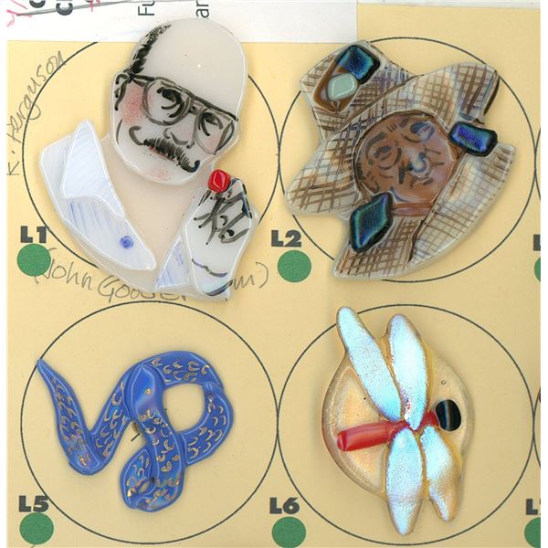 A PARTIAL CARD OF DIVISION THREE GLASS BUTTONS