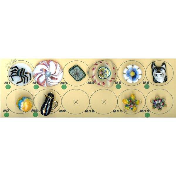 A PARTIAL CARD OF DIVISION THREE GLASS BUTTONS