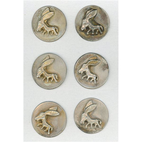 A SMALL CARD OF MATCHING METAL ANIMAL BUTTONS