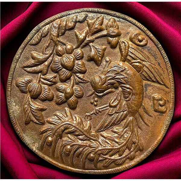 A DIVISION ONE REPOUSSE COPPER BUTTON