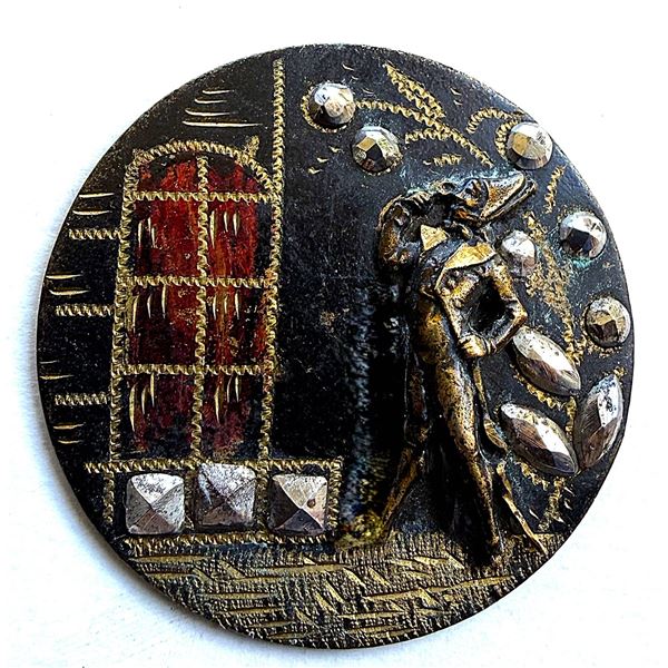 A DIVISION ONE TOLE FIGURAL BUTTON