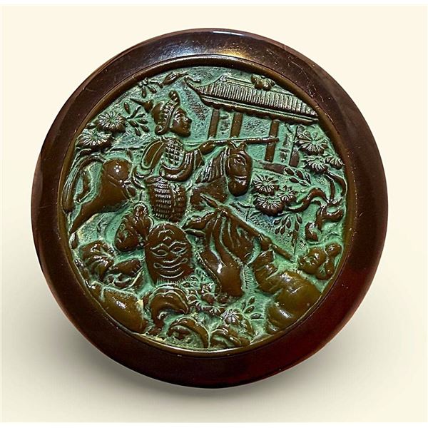 A DIVISION THREE GLASS FIGURAL IN BAKELITE