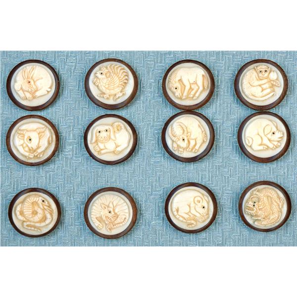 A SELECTION OF DIVISION THREE BONE IN WOOD BUTTONS