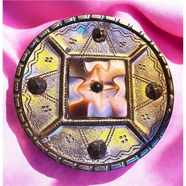 A DIVISION ONE STEEL CUP BUTTON WITH SHELL