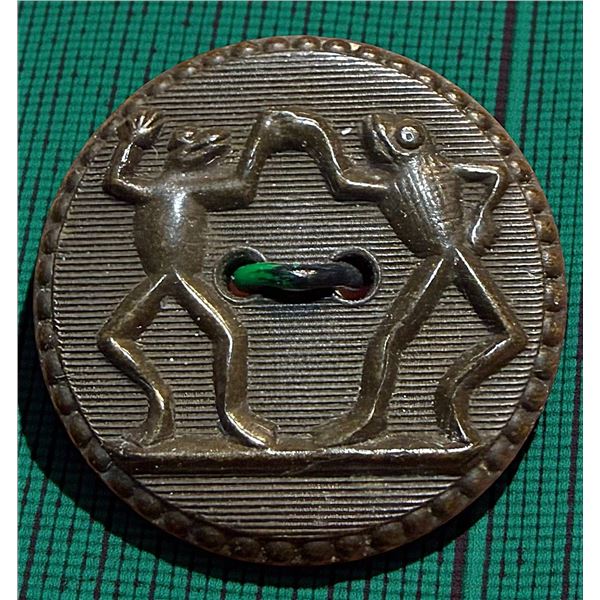 A DIVISION ONE BACKMARKED RUBBER BUTTON