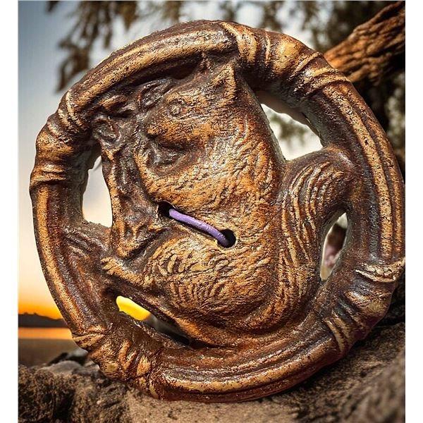 A DIVISION THREE PICTORIAL PIERCED WOOD BUTTON