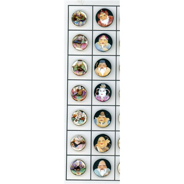 A SMALL CARD OF DIVISION THREE JAPANESE BUTTONS