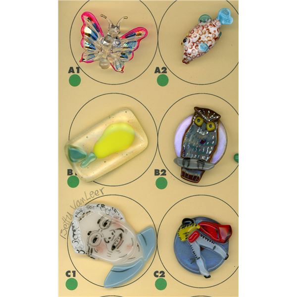 A PARTIAL CARD OF DIVISION THREE GLASS BUTTONS
