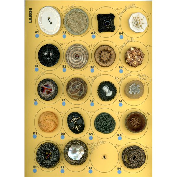 A CARD OF DIVISION THREE COUTURE STUDIO BUTTON