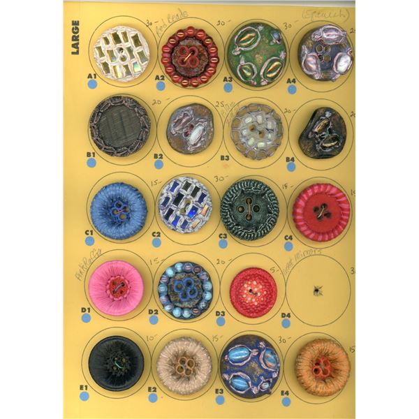 A CARD OF DIVISION THREE COUTURE STUDIO BUTTON