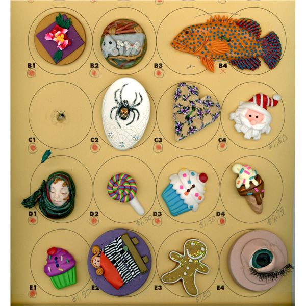 A PARTIAL CARD OF DIVISION THREE STUDIO BUTTONS