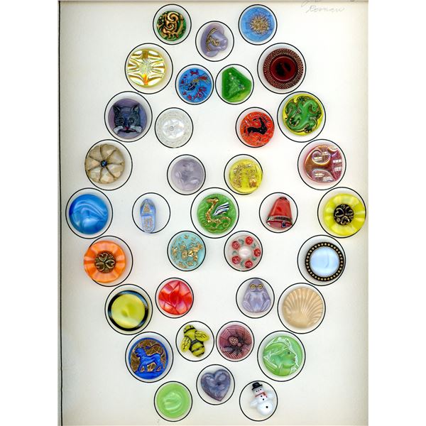 A CARD OF COLORFUL DIVISION THREE MOONGLOW BUTTONS