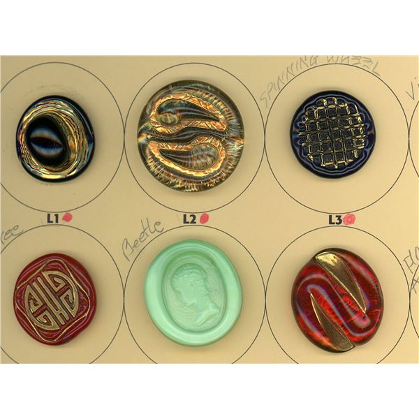 A PARTIAL CARD OF DIVISION THREE GLASS BUTTONS