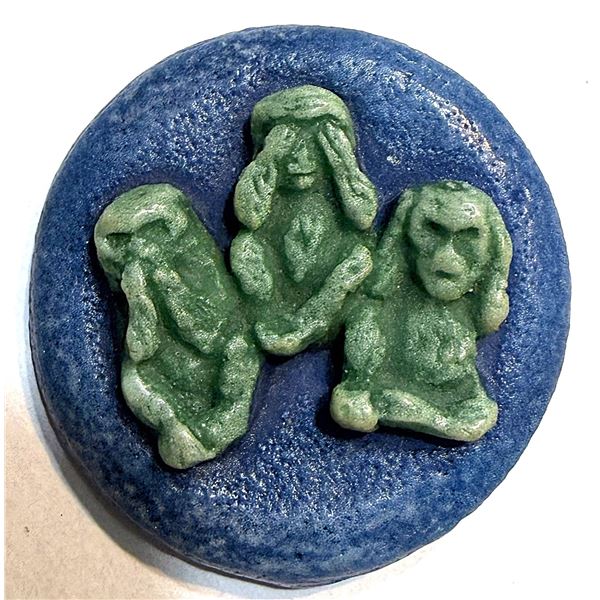 A DIVISION THREE PICTORIAL ANIMAL BUTTON