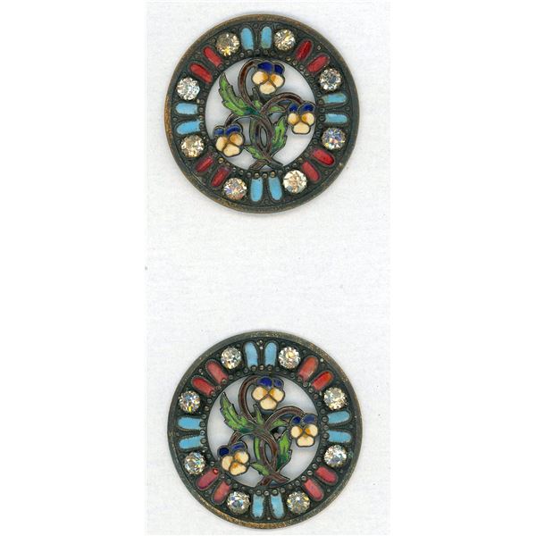 A PAIR OF PIERCED ENAMEL BUTTONS