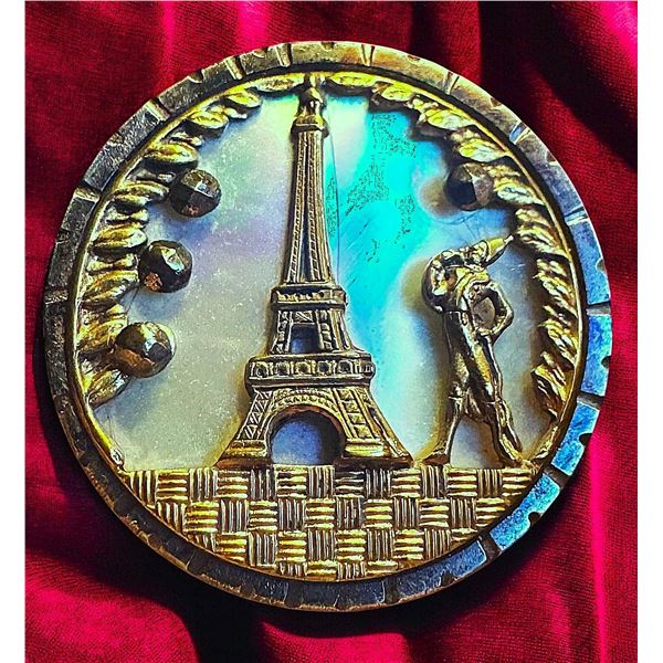 A DIVISION ONE SHELL AND FIGURAL STEEL CUP BUTTON