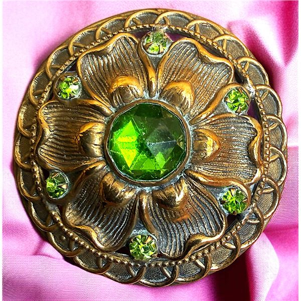 A DIVISION ONE LARGE ORNATE JEWELED BUTTON