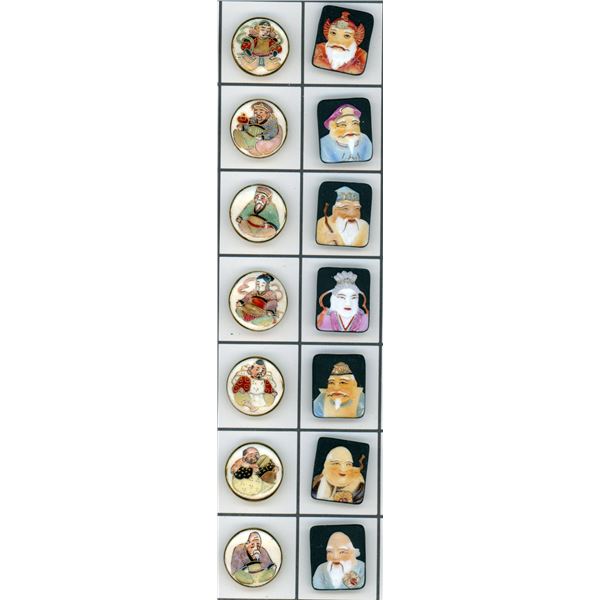 A SMALL CARD OF DIVISION THREE JAPANESE BUTTONS