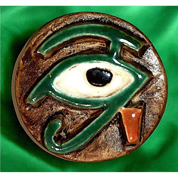 A DIVISION THREE PICTORIAL CERAMIC BUTTOIN