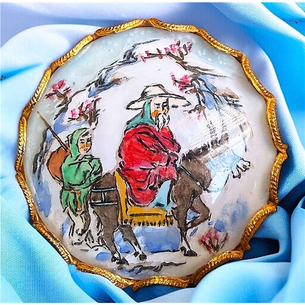 A DIVISION THREE REVERSE PAINTED GLASS BUTTON