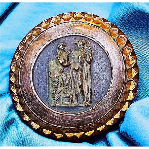 A DIVISION ONE FIGURAL COPPER BUTTON