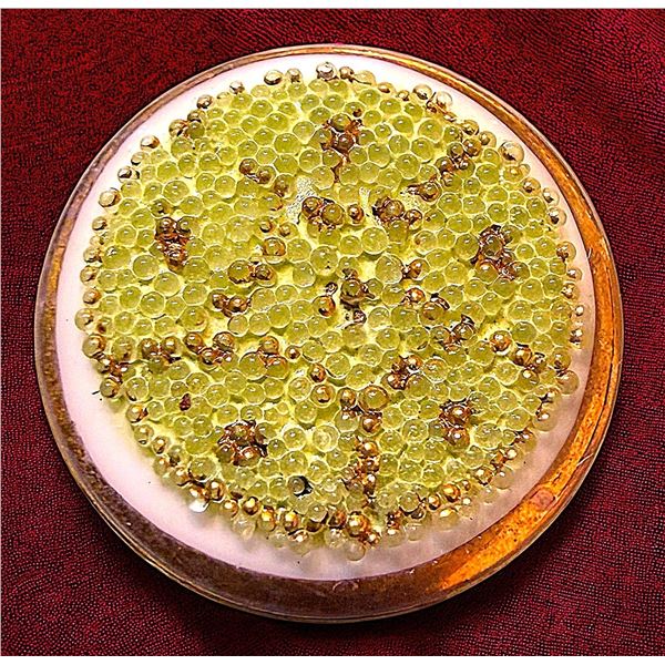 A DIVISION ONE CORALENE GLASS BUTTON